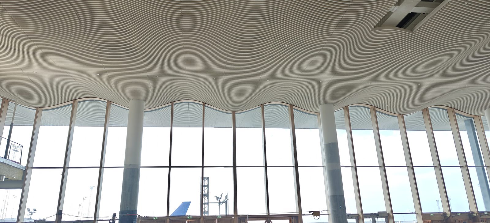 Airport terminal arched glass facade